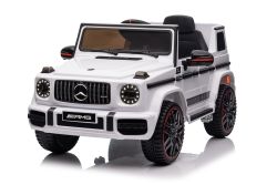 Auto elettrica per bambini Mercedes G Nuovo, bianco, con licenza originale, alimentazione a batteria, portiere apribili, sedile singolo, 2x motore, batteria da 12 V, telecomando da 2,4 Ghz, sospensione posteriore, avvio regolare